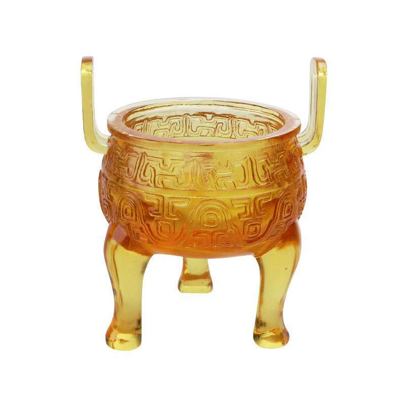 Adornos de trípode de esmalte de color dorado.