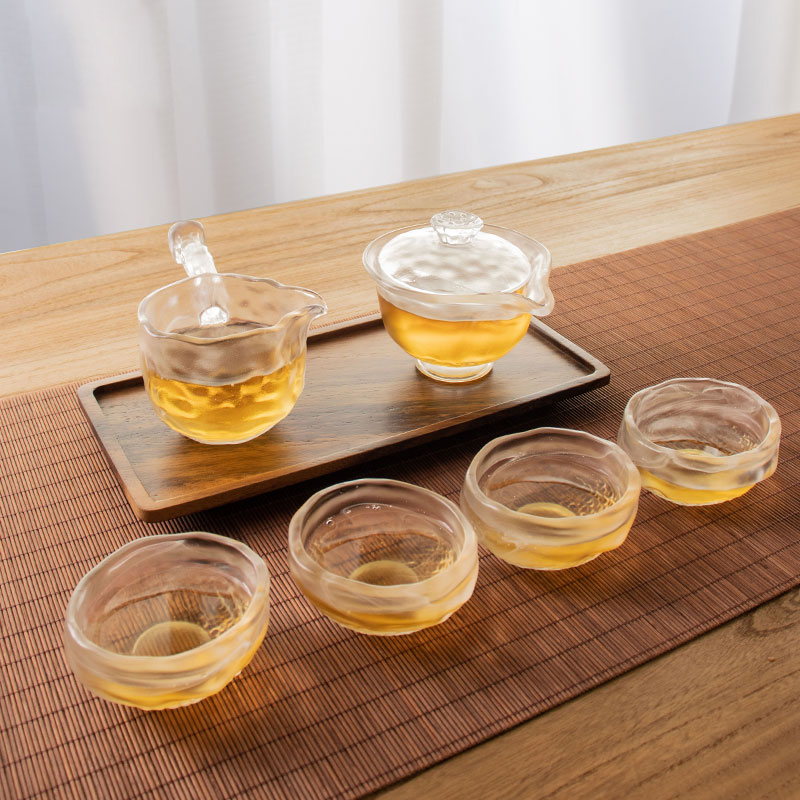 Juego de té de vidrio transparente con tetera, taza de té